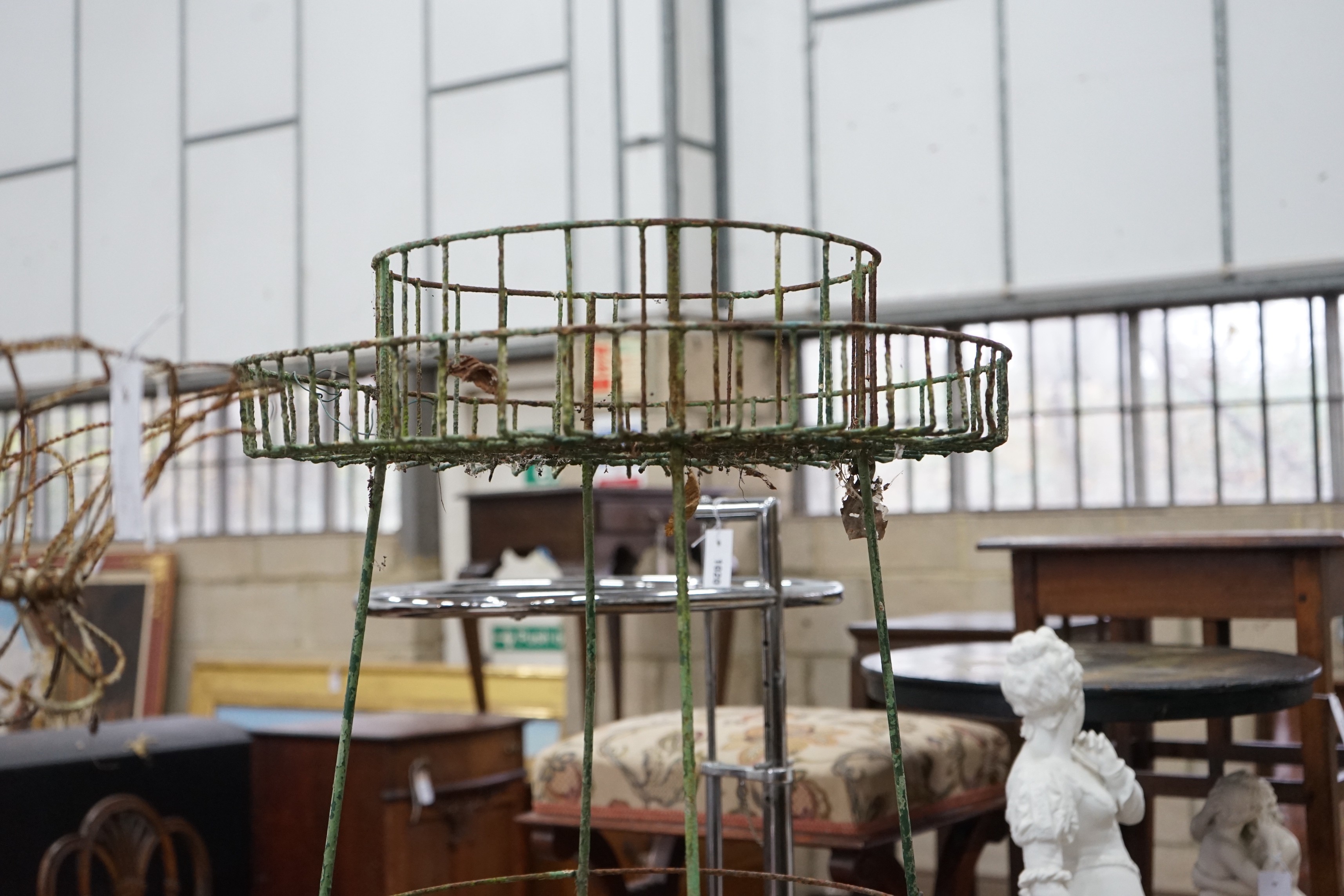 Two Victorian painted wirework pot stands, larger height 90cm